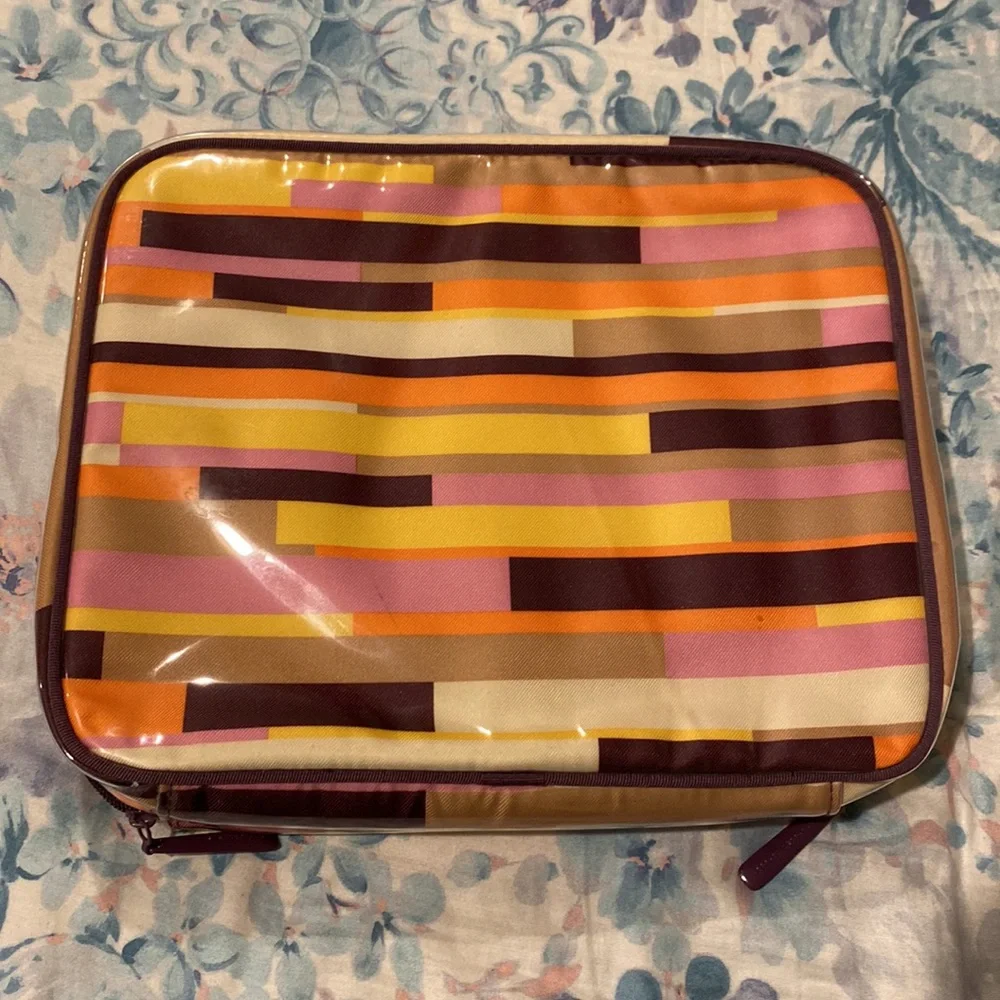 Victoria’s Secret travel case with removable pouches.